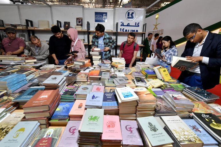 People visit the 37th Tunis International Book Fair in the Tunisian capital on April 29, 2023. The Tunisian president preached freedom of thought at the fair on April 28, shortly before authorities confiscated a book comparing him to Frankenstein, the publisher said. (Photo by FETHI BELAID / AFP)