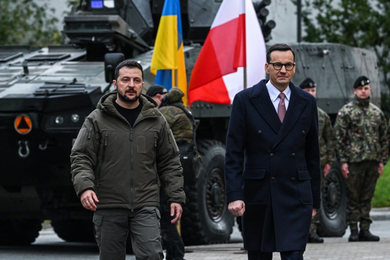 WARSAW, POLAND – APRIL 5:: Ukraine’s President, Volodymyr Zelenskyy and Poland's Prime Minister, Mateusz Morawiecki (not seen) inspect Polish-made Rosomak armored vehicles and greet Polish soldiers before delivering a statement to the press at the Prime Minister Chancellery on April 05, 2023 in Warsaw, Poland. The Ukrainian President will meet his Polish counterpart, Andrzej Duda and Poland's Prime Minister, Mateusz Morawiecki to discuss issues related to security, economic and agricultural cooperation. (Photo by Omar Marques/Getty Images)