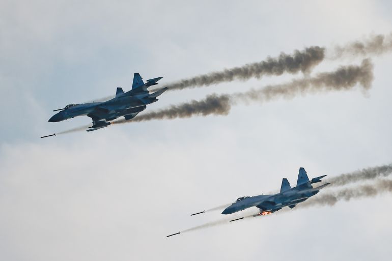 Russian Sukhoi Su-35 jet fighters fire missiles during the Aviadarts competition, as part of the International Army Games 2021, at the Dubrovichi range outside Ryazan, Russia August 27, 2021. REUTERS/Maxim Shemetov