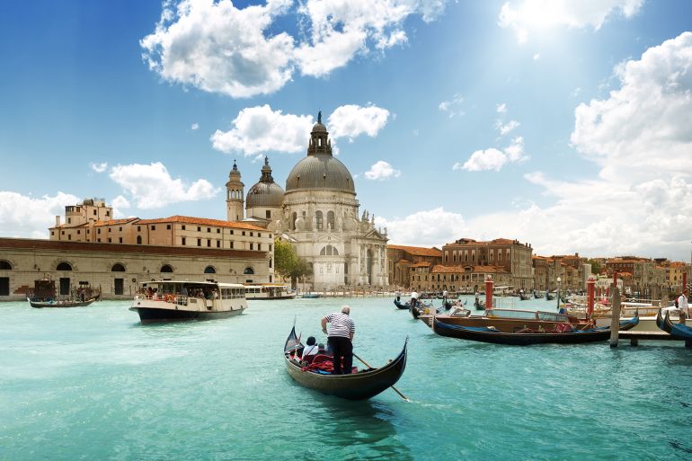Grand Canal and Basilica Santa Maria della Salute, Venice, Italy and sunny day; Shutterstock ID 116504368; purchase_order: ajanet; job: ; client: ; other:
