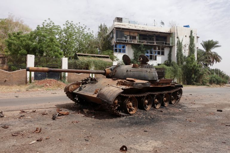 A damaged army tank is seen on the street, almost one year into the war between the Sudanese Armed Forces and the paramilitary Rapid Support Forces (RSF), in Omdurman, Sudan, April 7, 2024. REUTERS/El Tayeb Siddig