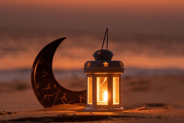 Lantern lamp with beach sunset view
